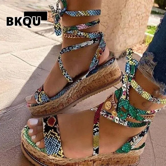 Stacked gladiator green leopard wedge
